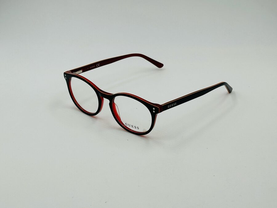 Guess rectangular frame with red accent