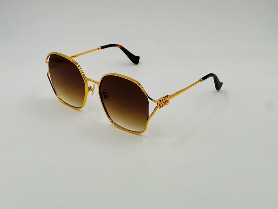 Miu Miu gold round metal sunglasses with brown gradient lens