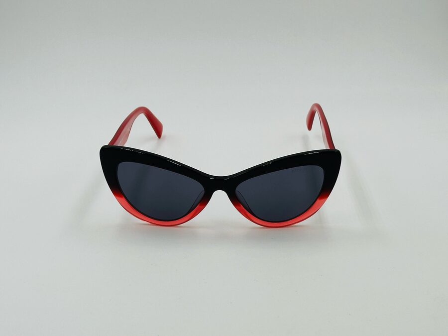 Miu Miu black cat-eye sunglasses with red temple