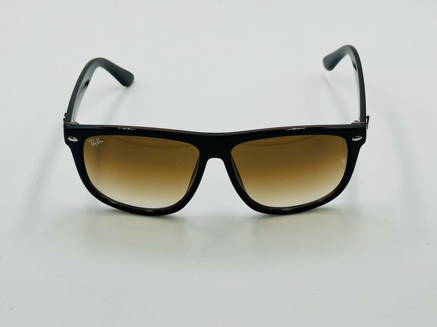 Ray-Ban black wayfarer sunglasses with amber gradient lens