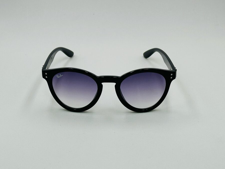 Ray-Ban black round acetate sunglasses with purple gradient lens