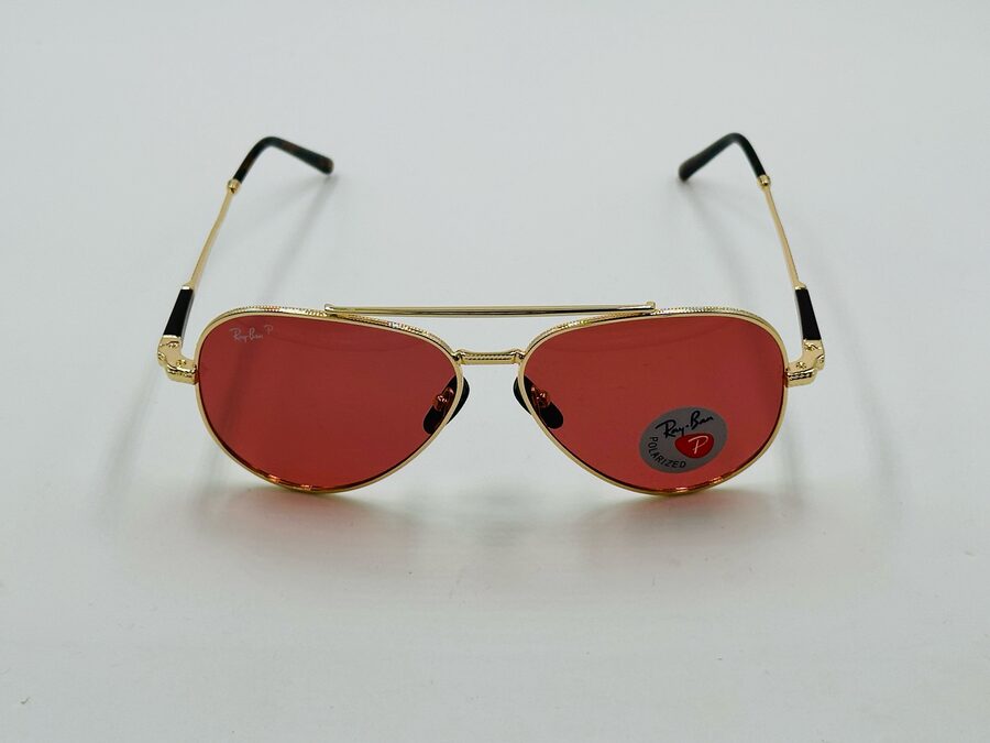 Ray-Ban gold aviator sunglasses with red lens