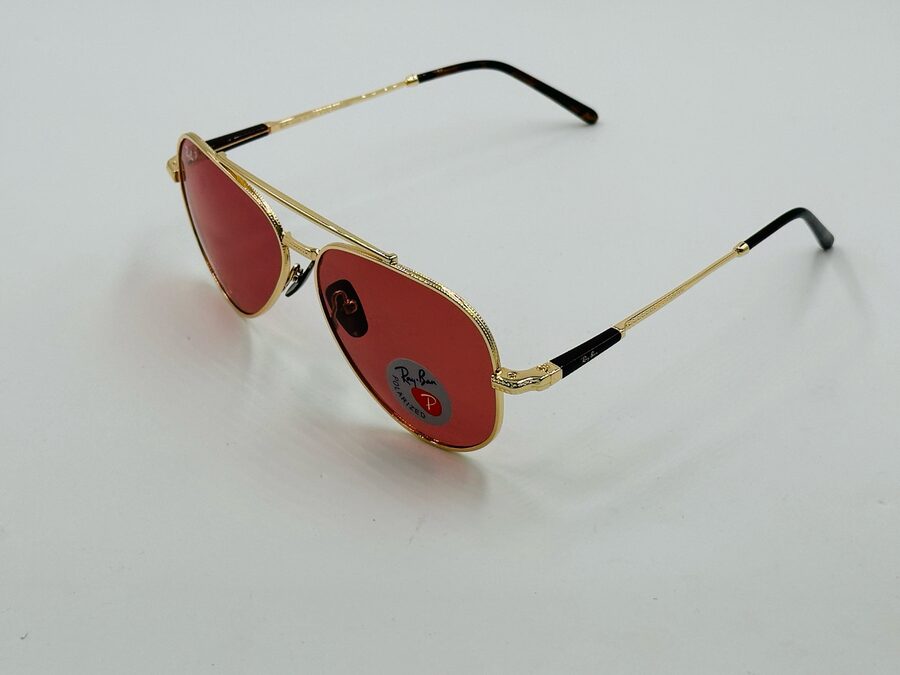 Ray-Ban gold double-bridge aviator sunglasses with red lens