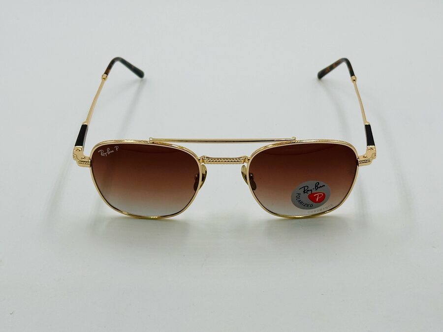 Ray-Ban gold aviator sunglasses with brown gradient lens